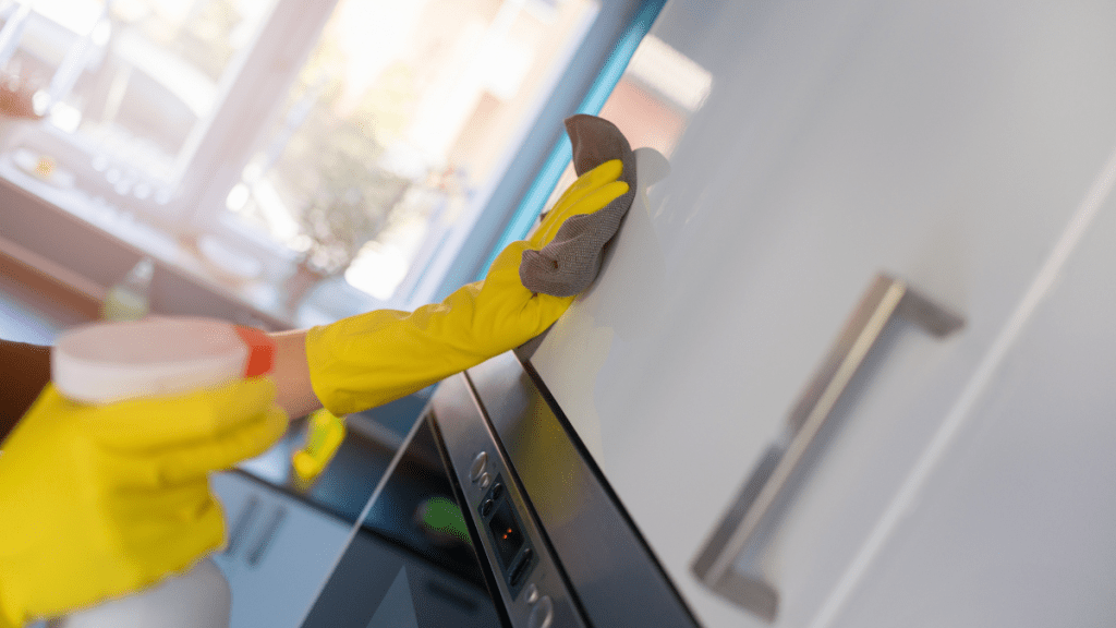 cleaning kitchen cabinet